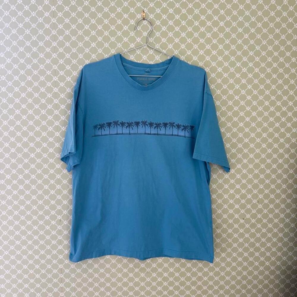 Vintage paradise shores blue palm tree graphic t shirt